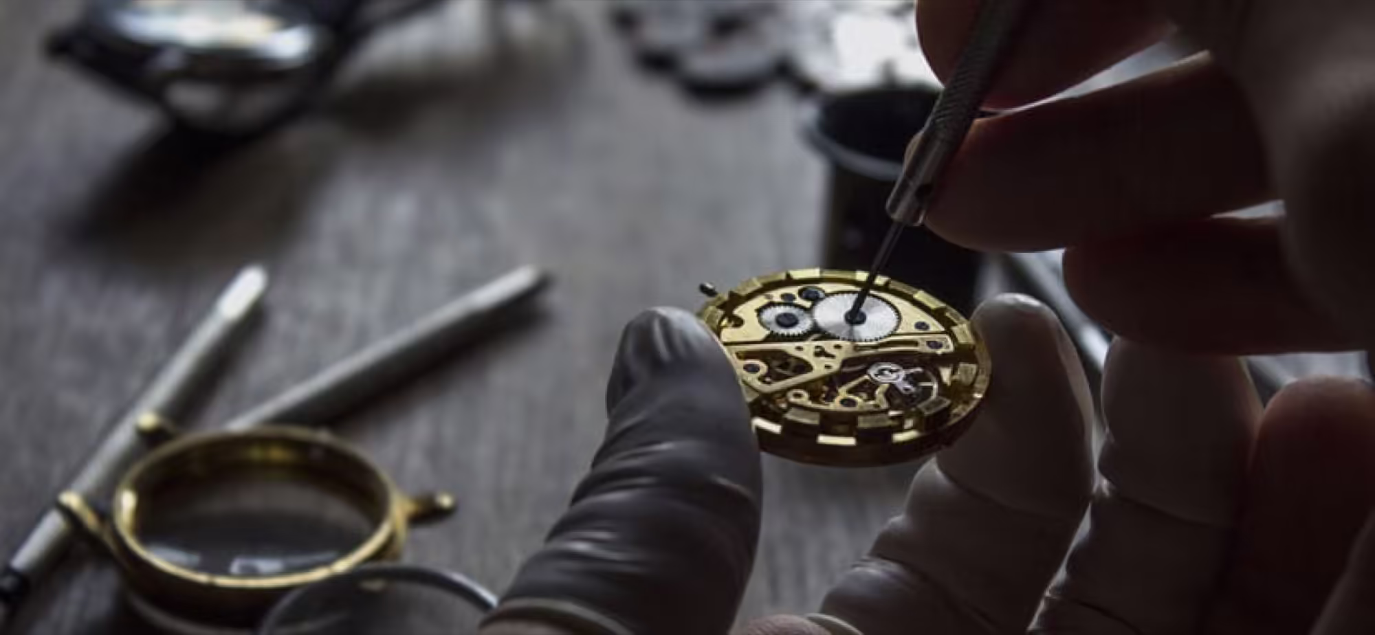 Watchmaker at the repair bench in Watch Empire, Dublin